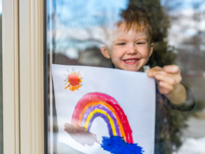 hopeful boy at window