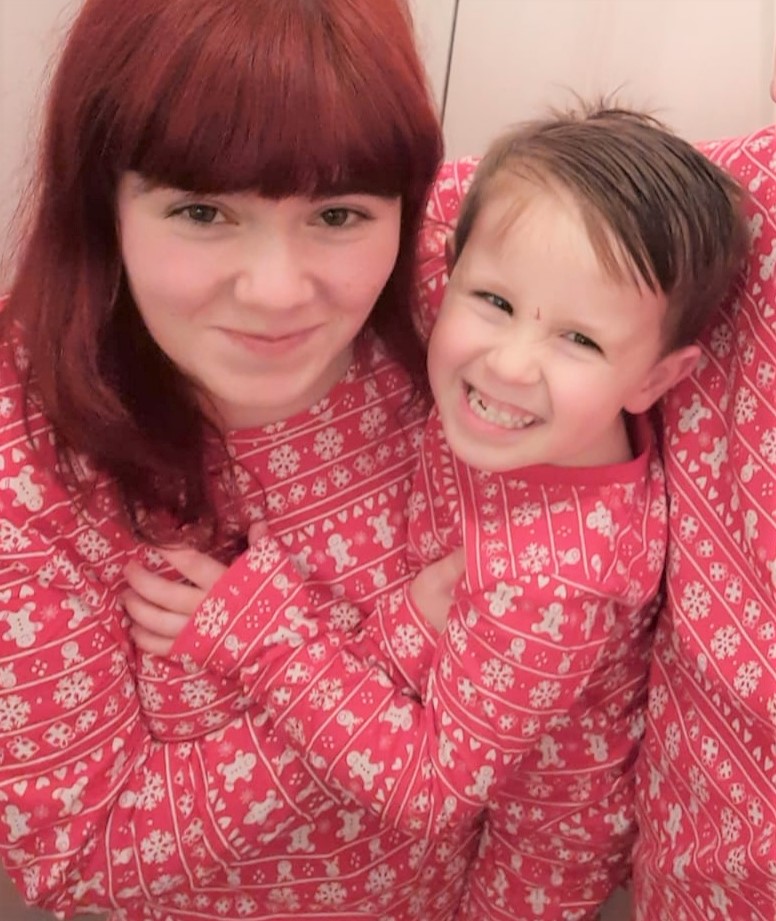 Shannon and AJ enjoy a cuddle in cosy pyjamas